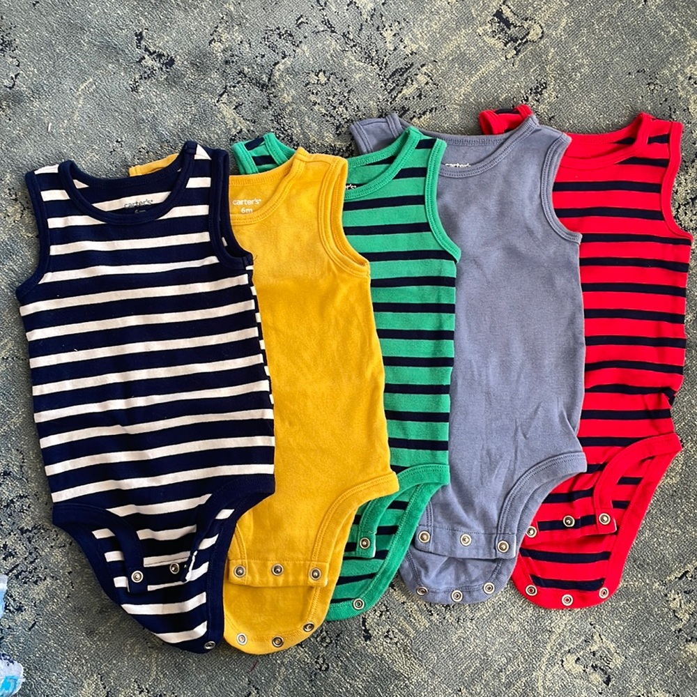 5 sleeveless Carter’s onesies.